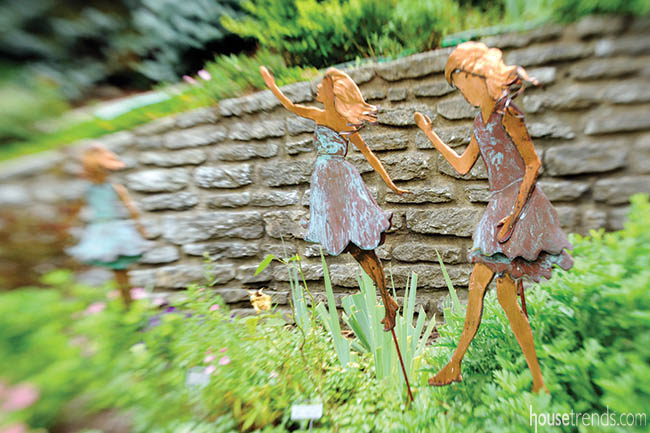 Statues add whimsy to garden