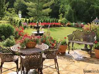 Patio is surrounded by a series of gardens