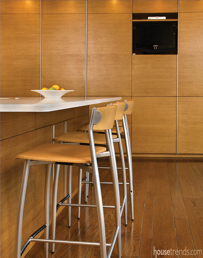 Random-width oak floor complements a kitchen remodel