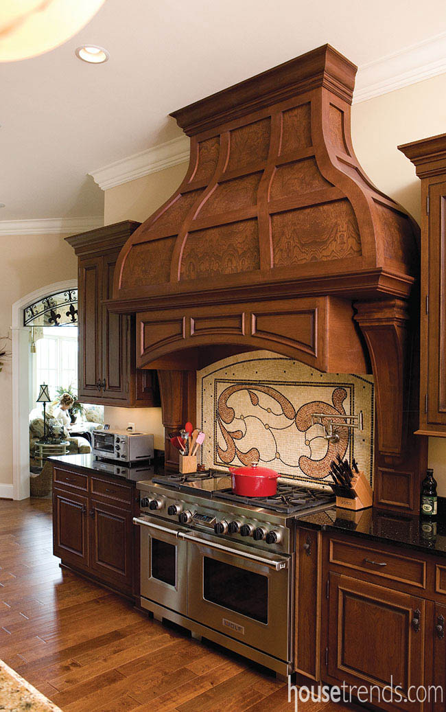 Mantle hood steals the spotlight in a gorgeous kitchen design