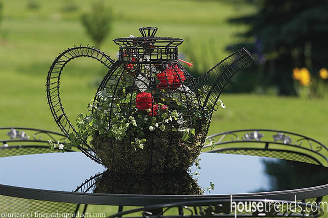 Topiary dresses up an outdoor table