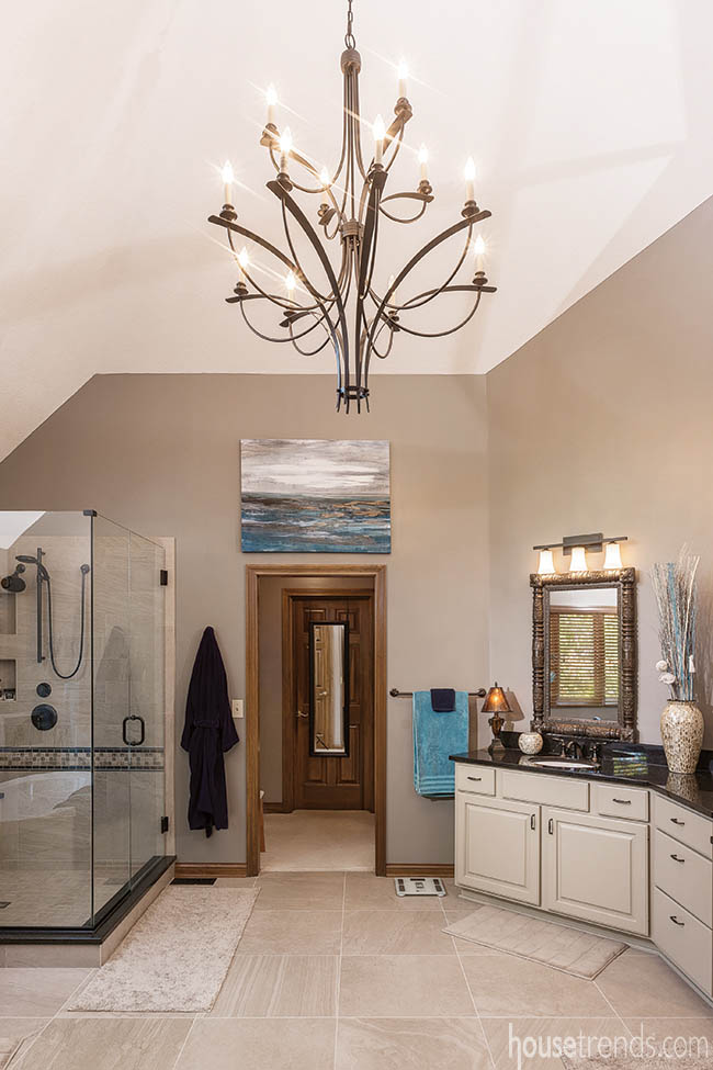Chandelier lightens up a master bathroom