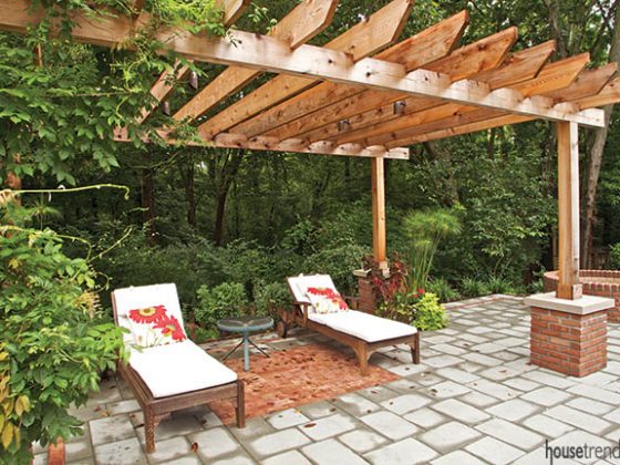 Slatted pergola shades a pair of lounge chairs