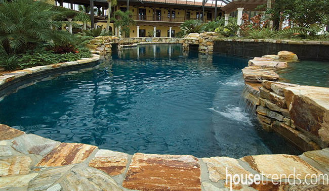 Bridge adds interest to a swimming pool