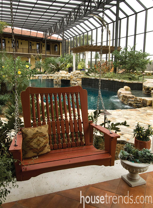 Porch swing takes in view of landscape design