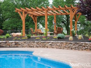 Pergola looks over a pool design