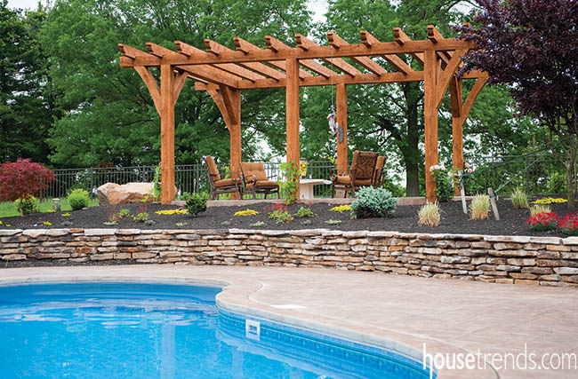 Pergola looks over a pool design