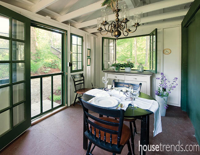 Backyard design boasts a chamring potting shed