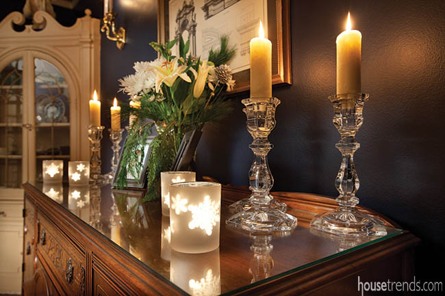 Candles add warmth to holiday decorations