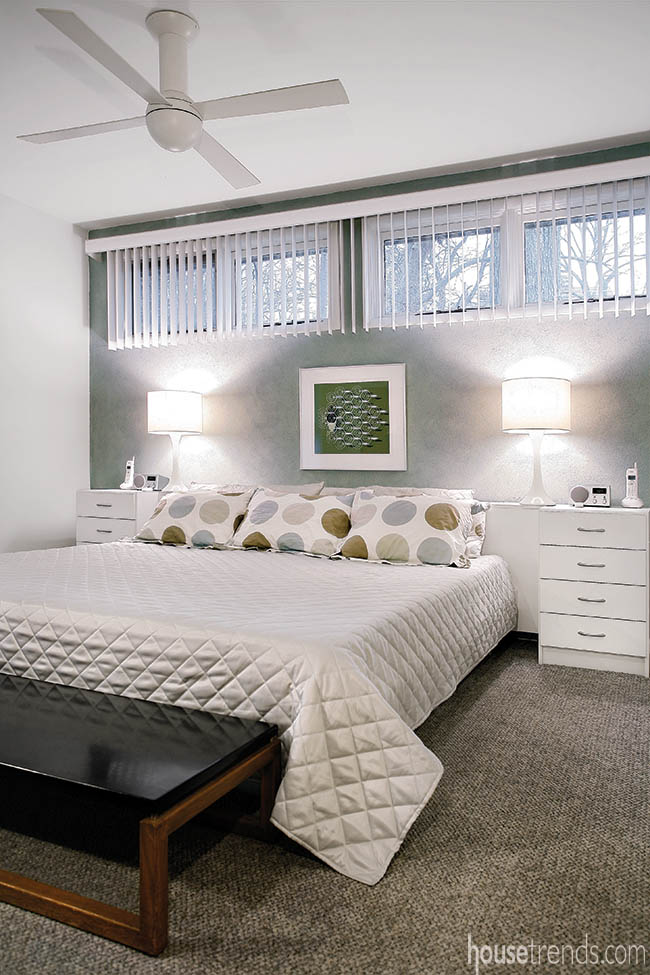 Vertical blinds keep a bedroom true to its time