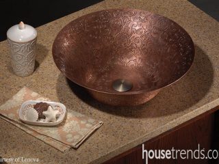 Vessel sink creates a rustic bathroom design