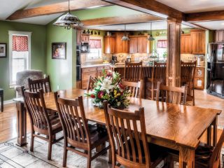 Oak kitchen cabinets help define the space