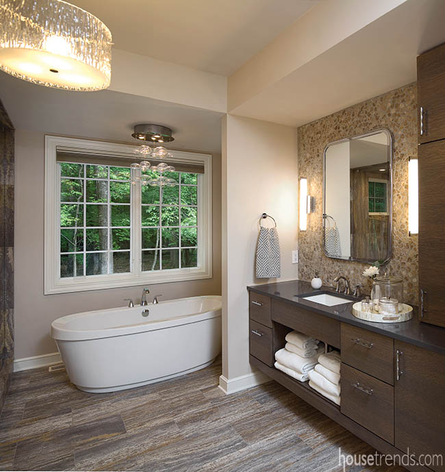 Light fixture adds glamor to a master bath