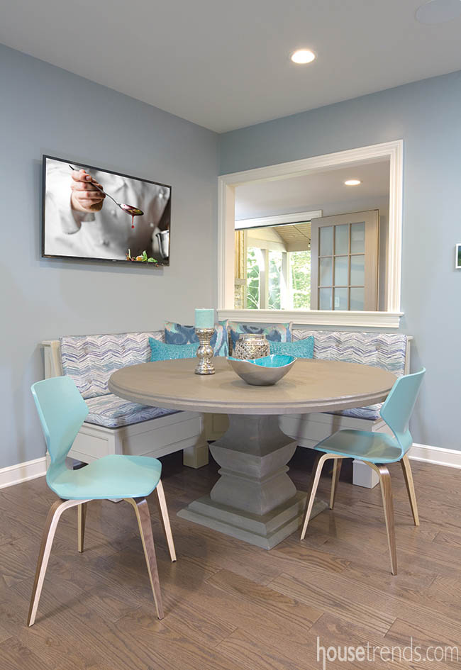 Oak flooring runs through a kitchen