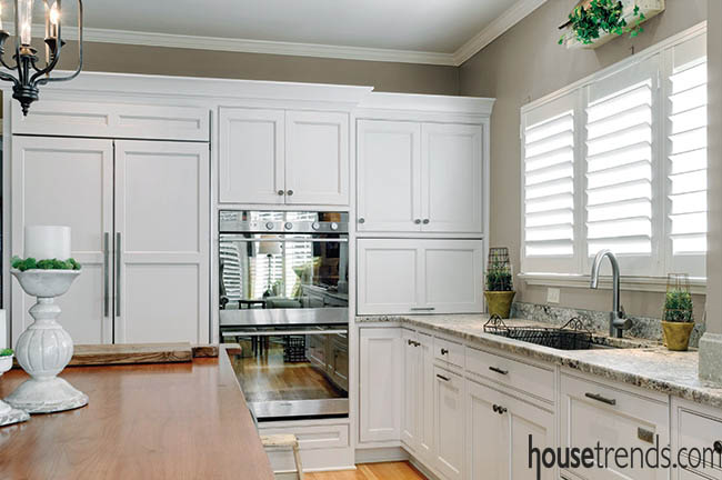 White cabinets keep a kitchen cheery