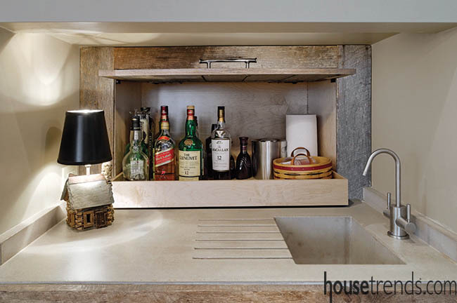 A hidden wet bar reminiscent of the Speakeasy days