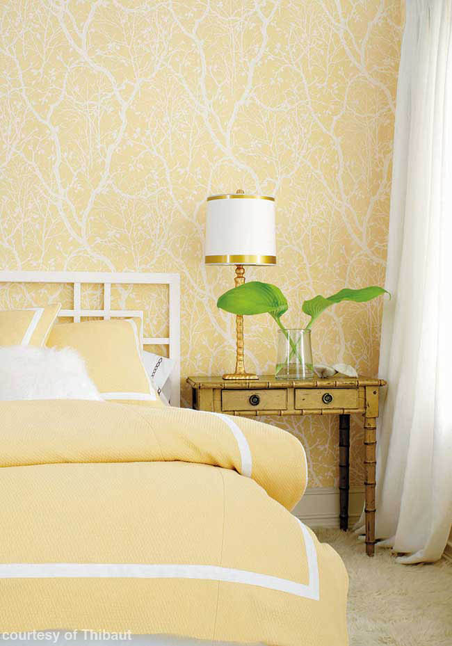Yellow wallpaper in a guest room
