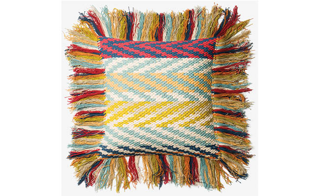 Patterned pillow adds a punch of color to outdoor furniture