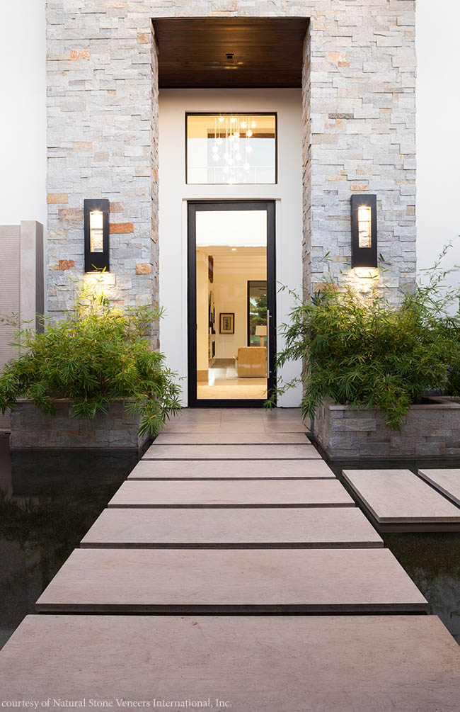 Stone brackets a front entry