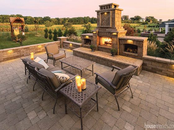 Fireplace adds privacy to an outdoor living space