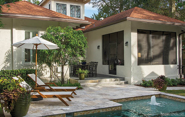 Travertine pavers form a stylish patio
