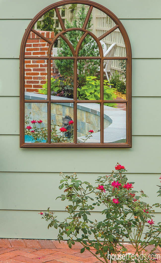 Mirrors shine in a back yard design