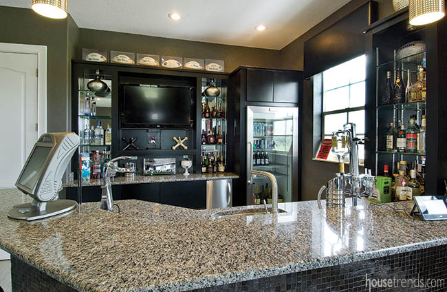 Granite countertops line a bar