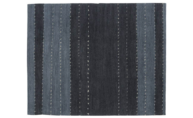 Area rug mimics a desert at twilight