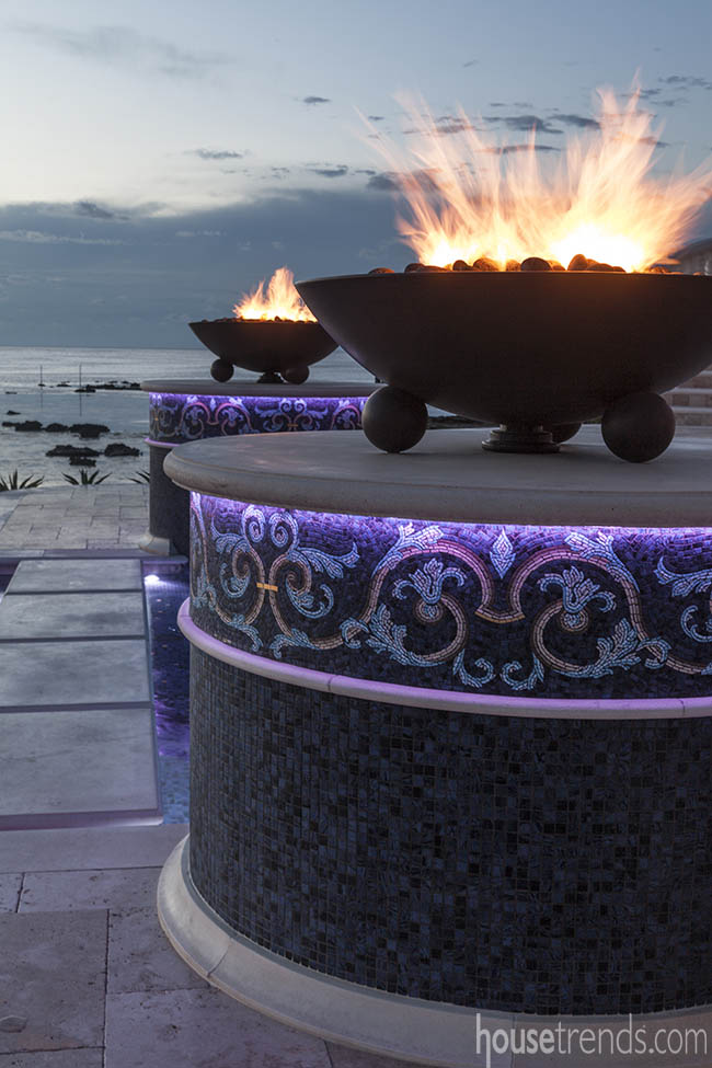 Fire features light up a back yard