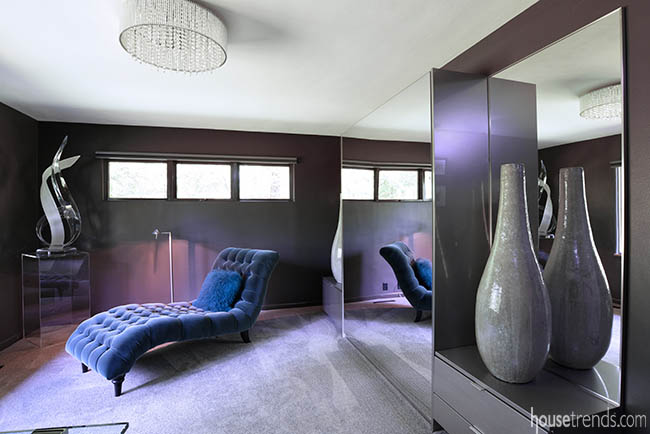 Murphy bed hidden behind a mirror