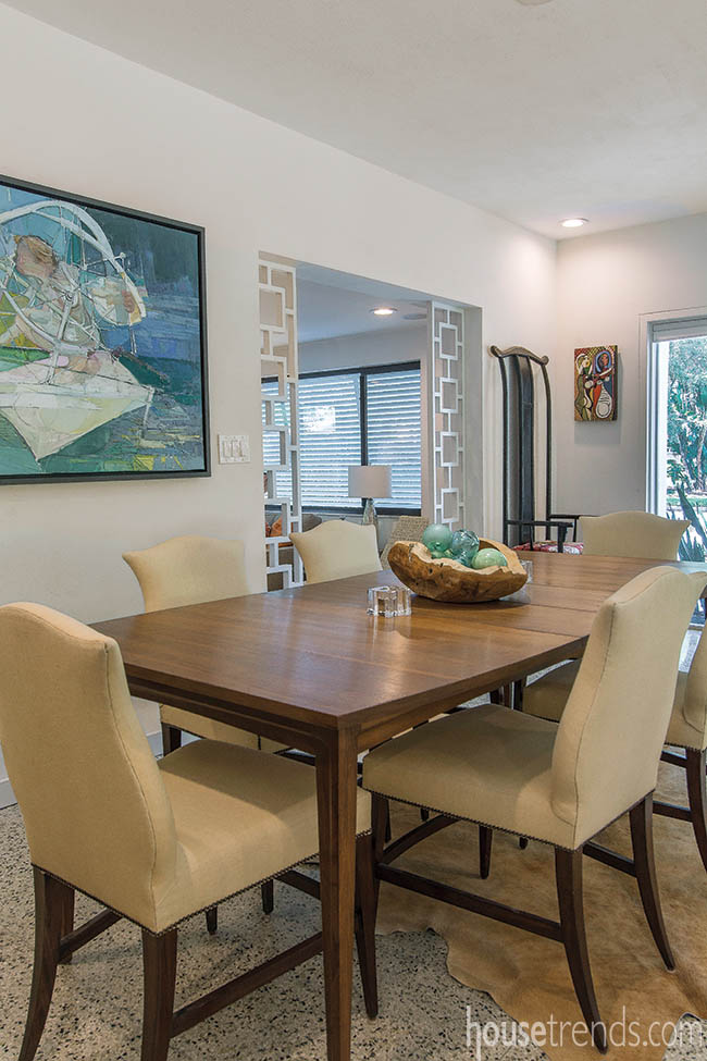 Dining space relies on wall art for color