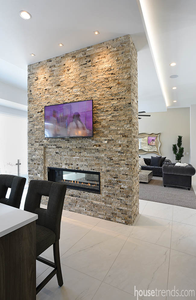 Two-sided fireplace gives the illusion of privacy