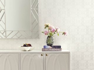 Sophisticated wallpaper completes an entryway