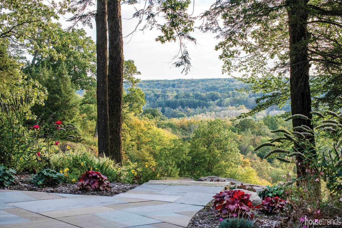 Boulders anchor a home with a view between a rock and a beautiful place
