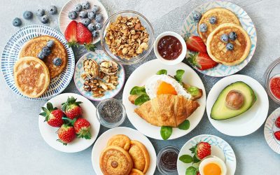 Breakfast food table. Festive brunch set, meal variety with gran